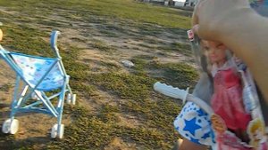 Коляска для кукол распаковываем гуляем катаем куколку. Ездим на велосипеде.