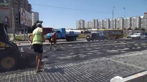 Укладка асфальта на стеклопластиковую сетку