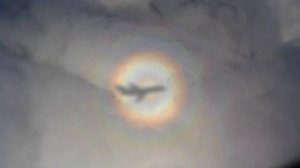 Глория-оптическое явление в облаках.