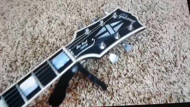 Gibson Les Paul Custom Silverburst смотреть онлайн