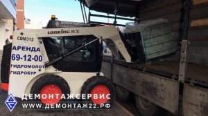 Разгрузка фуры мини-погрузчиком с палетными вилами