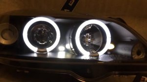 Фары передние Opel Astra G 98-04 ангельские глазки (как светят)