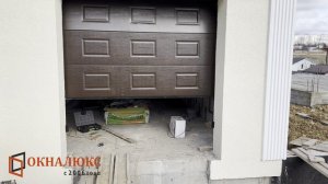 Работа автоматических секционных ворот Алютех установленных в Севастополе