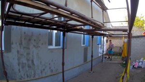 Гладкий фасад Утепление  Выравнивание стен двухэтажного дома панелями OSB