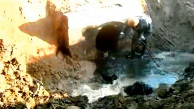 Чистка водопропускной трубы в России...