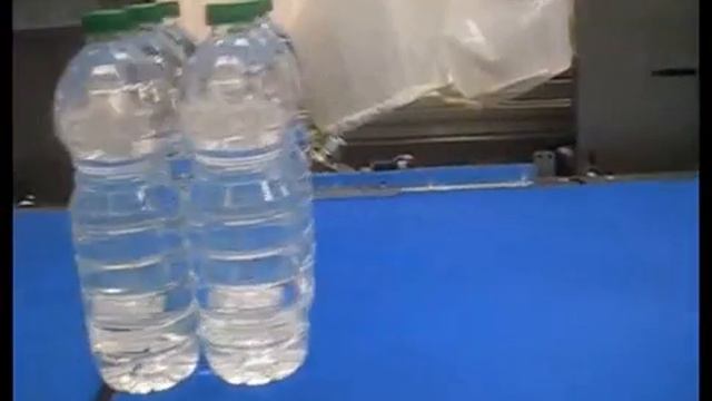 Упаковка в полиэтилен ПЭТ бутылок по 2 литра . смотреть онлайн