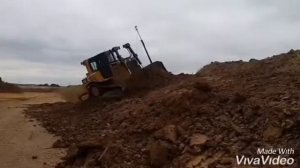 Планировка выемки откосов на бульдозере