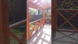 Терраса из ДПК с прозрачным навесом