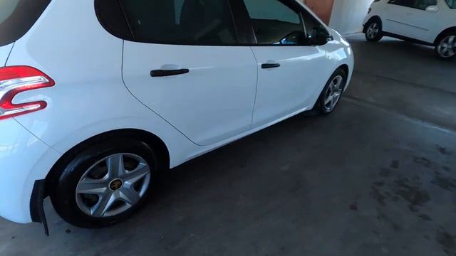 Peugeot 208 I 1.4 MT (68 л.с.) 2014 смотреть онлайн