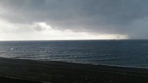 Черное море из окна поезда. Гроза