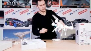 Лучший квадрокоптер для новичка Syma X8SW. Обзор - Распаковка и полет