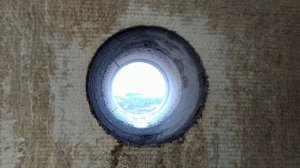 Круглое отверстие в бетонной стене панельного дома, с помощью алмазного бурения, безударным способо