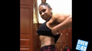 41 years young muscle woman Aymara flexing her biceps