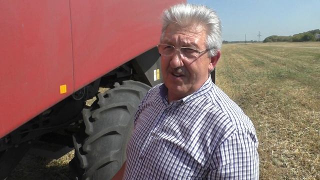 Работа в поле. Помогаем омским хлеборобам с настройкой комбайна.