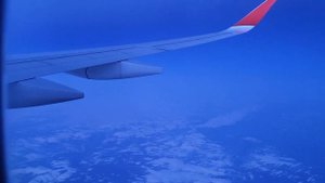 Вид из окна самолёта Аэробус а350-900 где-то над Сибирью