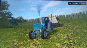 уборка рулонов с помощью трактора т-40ам.