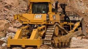 Почему у тракторов Caterpillar гусеницы треугольные, а у других нет?