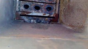 Старый КСТ-16 переделанный в котел длительного горения спесчанным затвором на загрузочной дверце