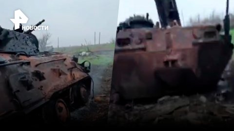 Уничтоженный БТР прямым попаданием из российского танка догорает на Бахмутском (Артемовском) участке