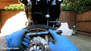 BMW R1200gs adventure 2008 front wheel removal and axel maintenance