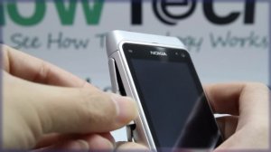 Nokia N8: Inserting the SIM Card