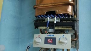 Отопления с помощью газовой колонки и самодельного тепловентилятора.