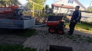 Мотомул буксирует прицеп