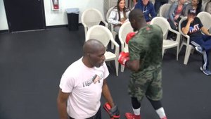 Roger Mayweather padwork with TMT star Andrew Tabiti