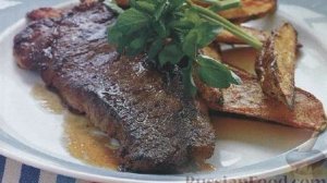 Говяжьи стейки под соусом