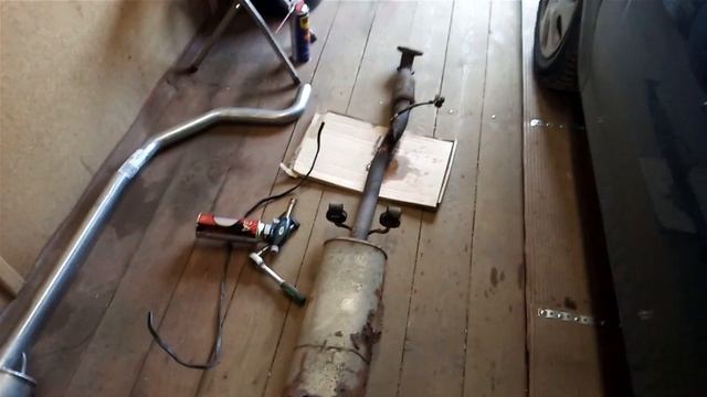 Opel Corsa D | Замена глушителя смотреть онлайн