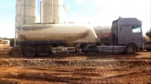 ? выгрузка цемента в силос, цементовозы DAF