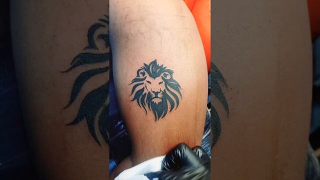 lion on biceps #tattoo at bicep