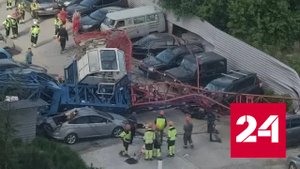Кадры с места падения башенного крана в Новосибирске появились в соцсетях - Россия 24