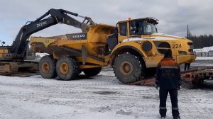 VOLVO A35F погрузка с помощью экскаватор