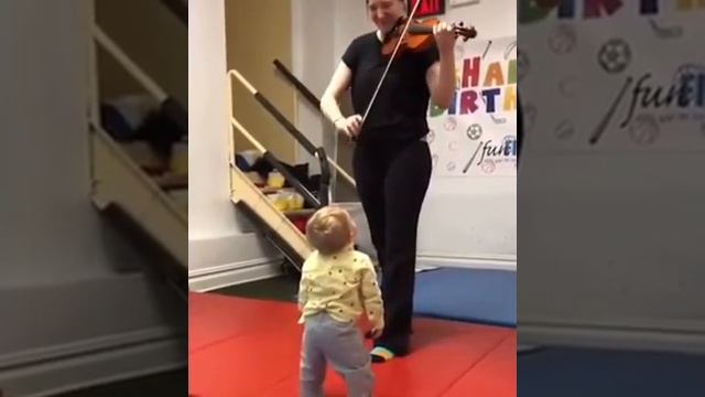 Baby hears violin for the first time and is completely amazed  Wholesome