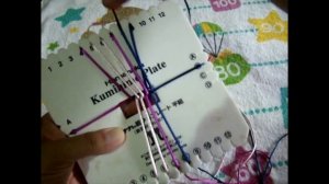 Плетеный браслет Кумихимо.