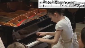 11 year old girl Alexandra Dovgan playing a fast pace piano concerto with crystal clear clarity