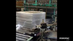 Обмотка паллеты с тротуарной плиткой в стрейч-плёнку. Паллетообмотчик Robopac с вращающимся столом.