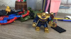 ОБЗОР НА ЛЕГО ФИГУРКУ ТАНОСА!!!!! ШОК ОТЛИЧНАЯ ФИГУРКА СО ВСЕМИ КАМНЯМИ БЕССКОНЕЧНОСТИ