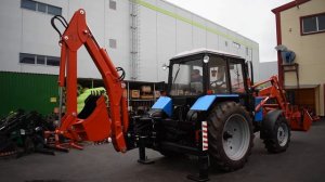 Экскаватор ЭО 2626 с погрузчик ПФН 09 на базе балочного трактора МТЗ 82 с челюстным ковшом
