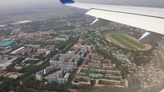 Views of Almaty from airplane while landing at Almaty (ALA) airport Kazakhstan смотреть онлайн