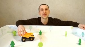 Динозавр погрыз колесо.Синий трактор помогает починить сломанный грузовичок