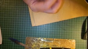 Косметичка из кусочков кожи_