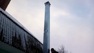 Утепление голого дымохода. Труба из чёрного металла. Стальная.