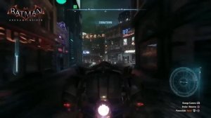 Бэтмен летает над ночным Готэмом в Batman: Arkham Knight