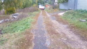 Забор с кирпичными столбами и откатными воротами