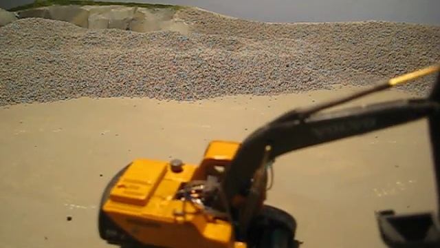 Grävmaskin Volvo EC 210 skala 1:87 смотреть онлайн
