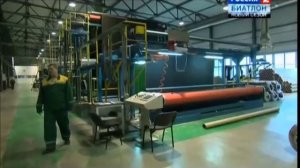 Как "выращивают" искусственный газон для футбольного поля