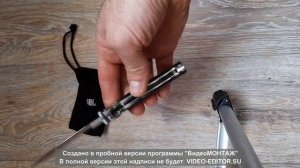 Выкидной нож с жёсткой пружиной и открыванием при помощи подвижной гарды.