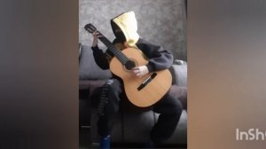 Аигел Пыяла на гитаре